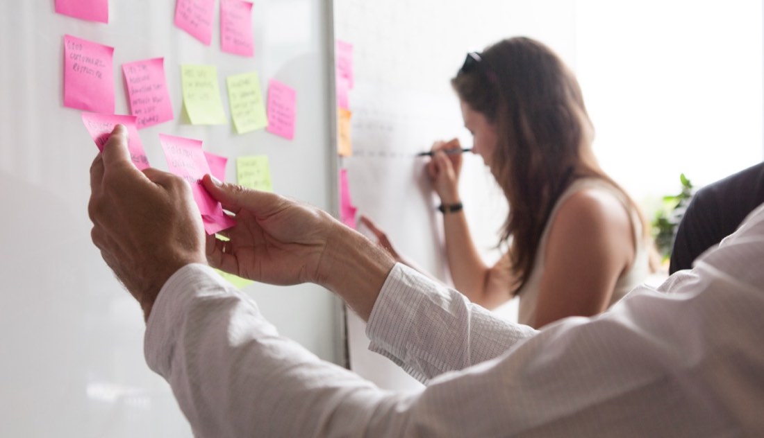 Mapping customer experience on a wall of insights during a journey-mapping session